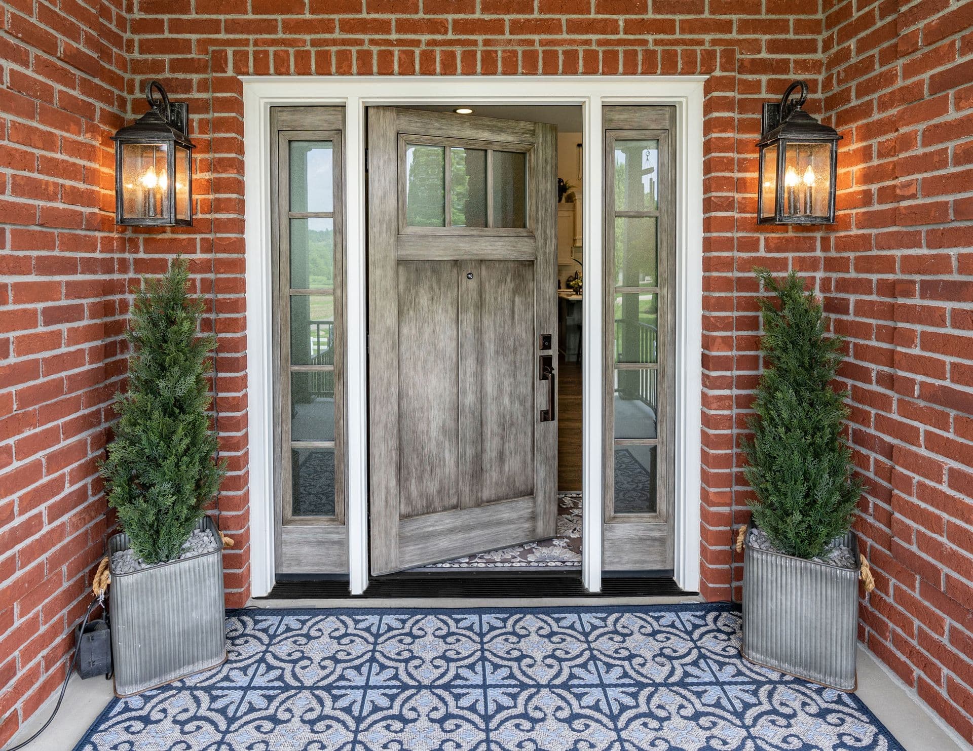 Entry door outside brick home