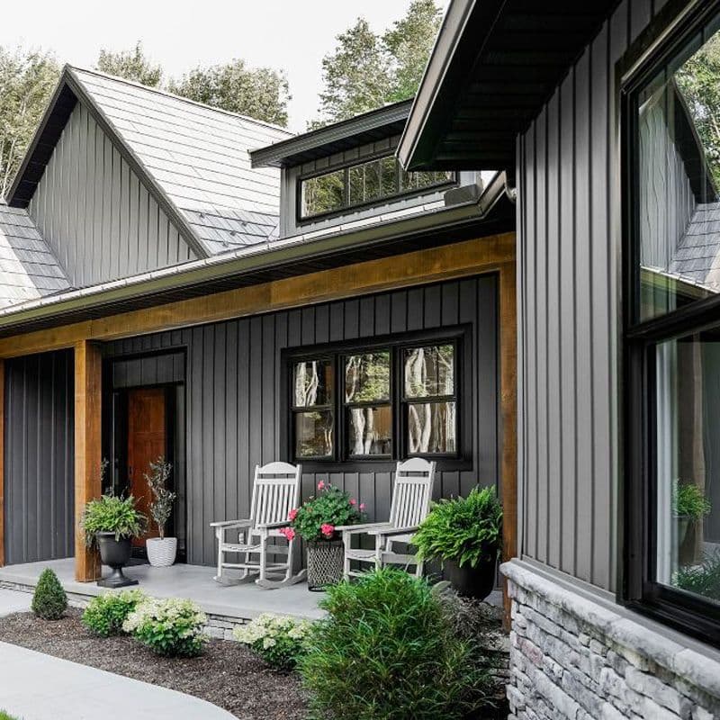 Windows on the side of a gray house